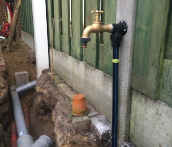 Aftap punt regenwater tank