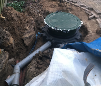 Leidingen regenwater tank